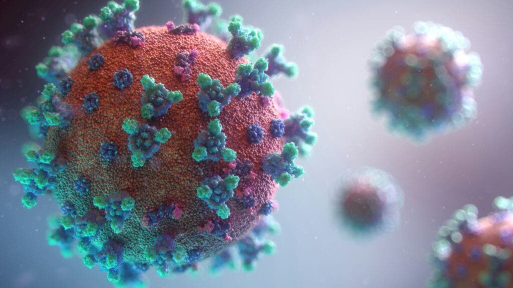 close-up color digital illustration of the coronavirus, COVID-19.