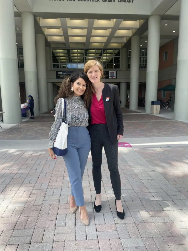 Photo of Pierina and USAID administrator Samantha Power posing together, smiling.