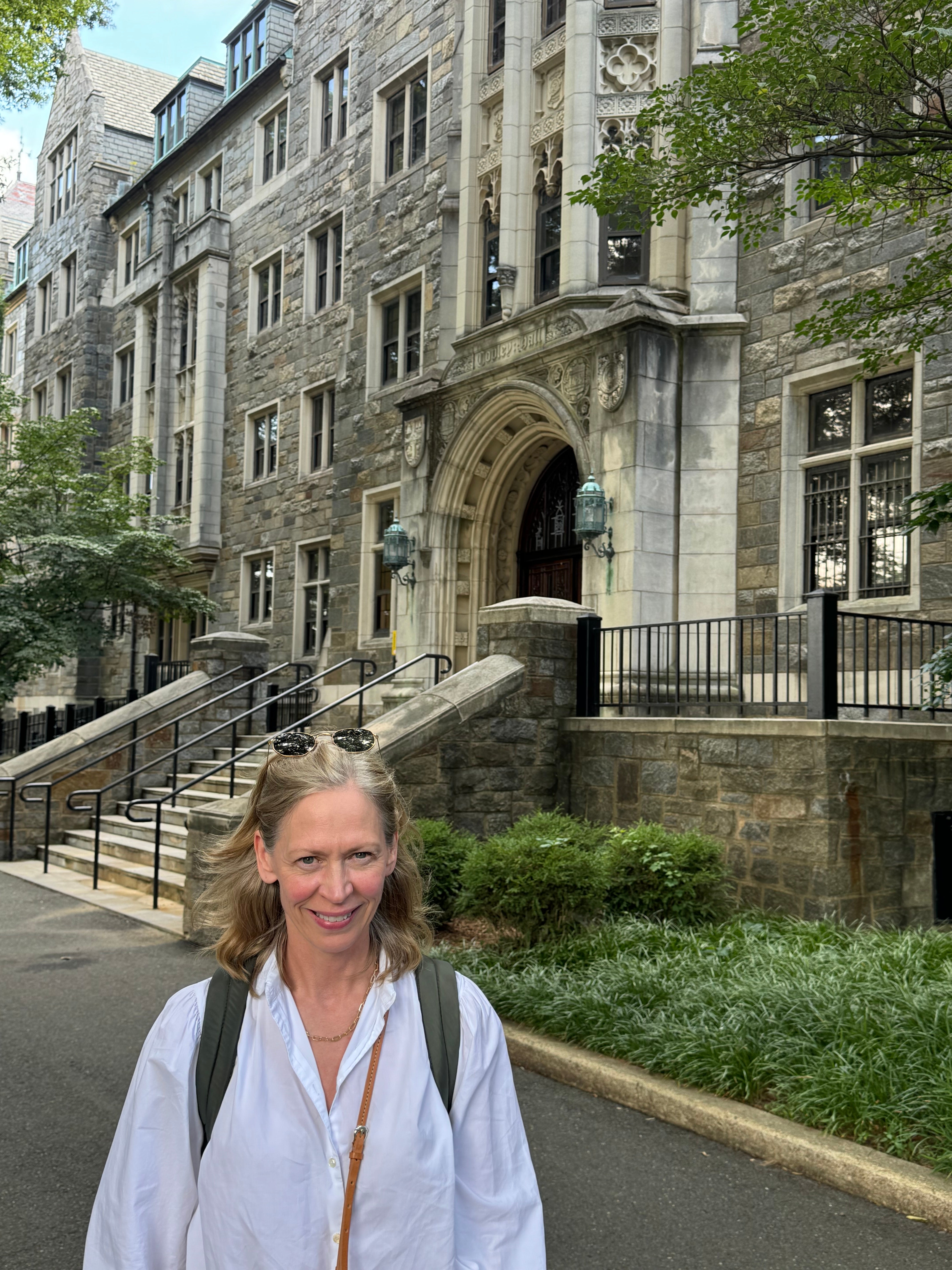 Julie Fette stands in front of Copley Hall.