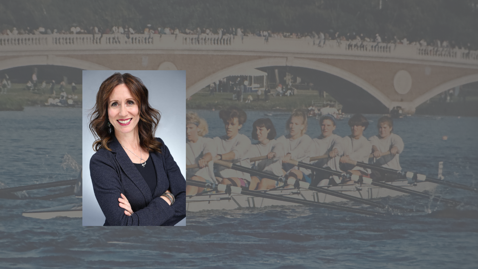 Woman with red-brown hair wearing a dark grey suit coat and black shirt, superimposed over photo of teenage girls rowing crew.