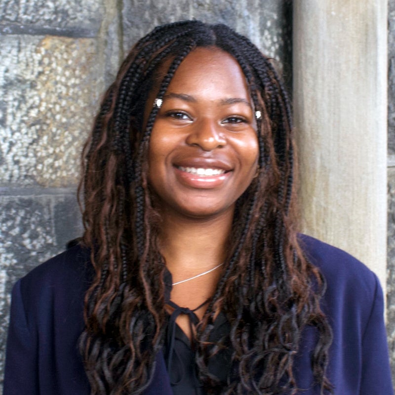 Headshot of Carmela CADJA smiling