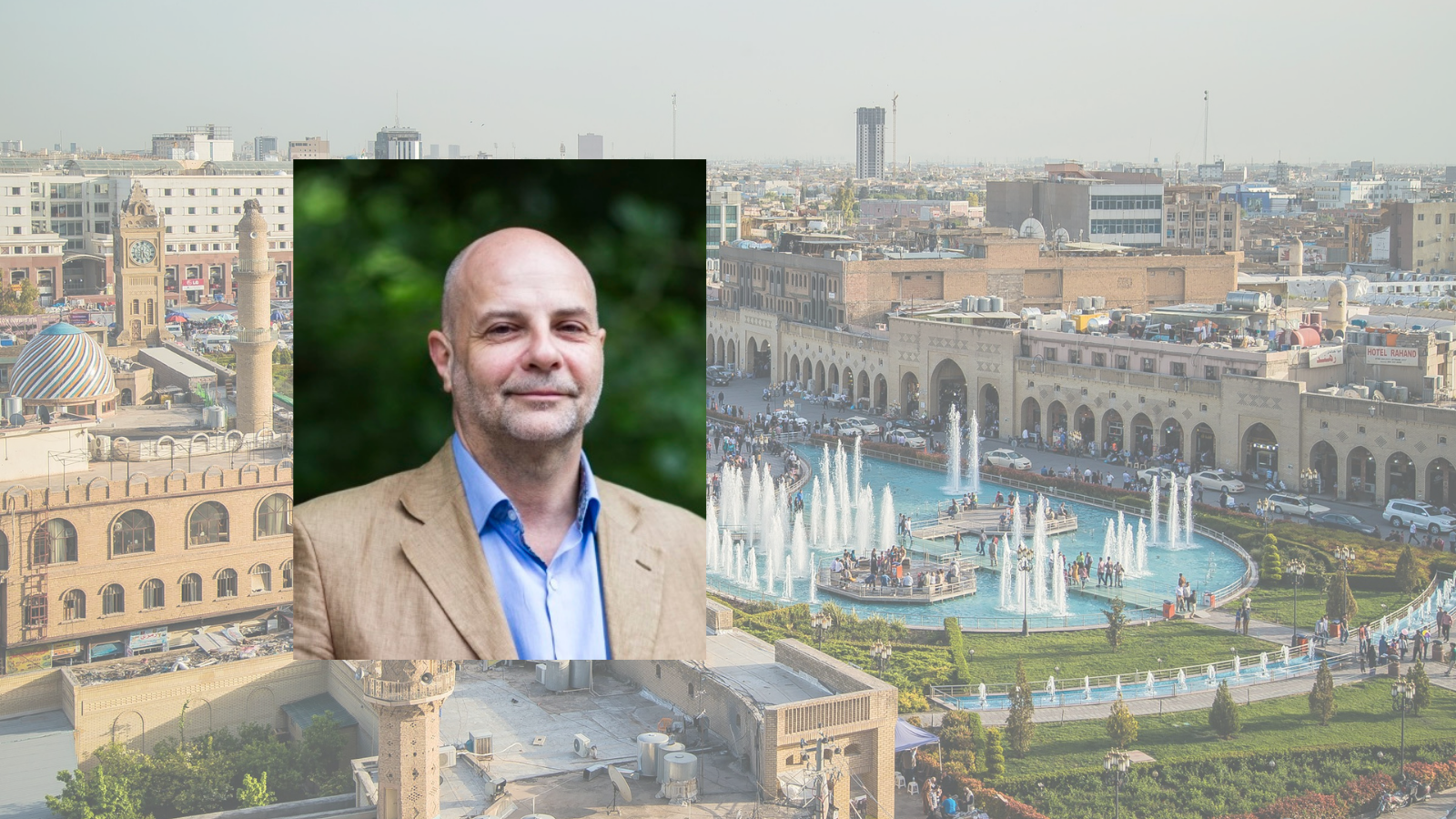 Aerial view of Iraq, featuring historical architecture and a bustling square with fountains. A smaller inset photo shows a person smiling, set against a blurred green background.