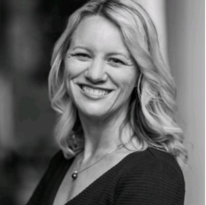 Headshot of a smiling Professor Jodi Vittori
