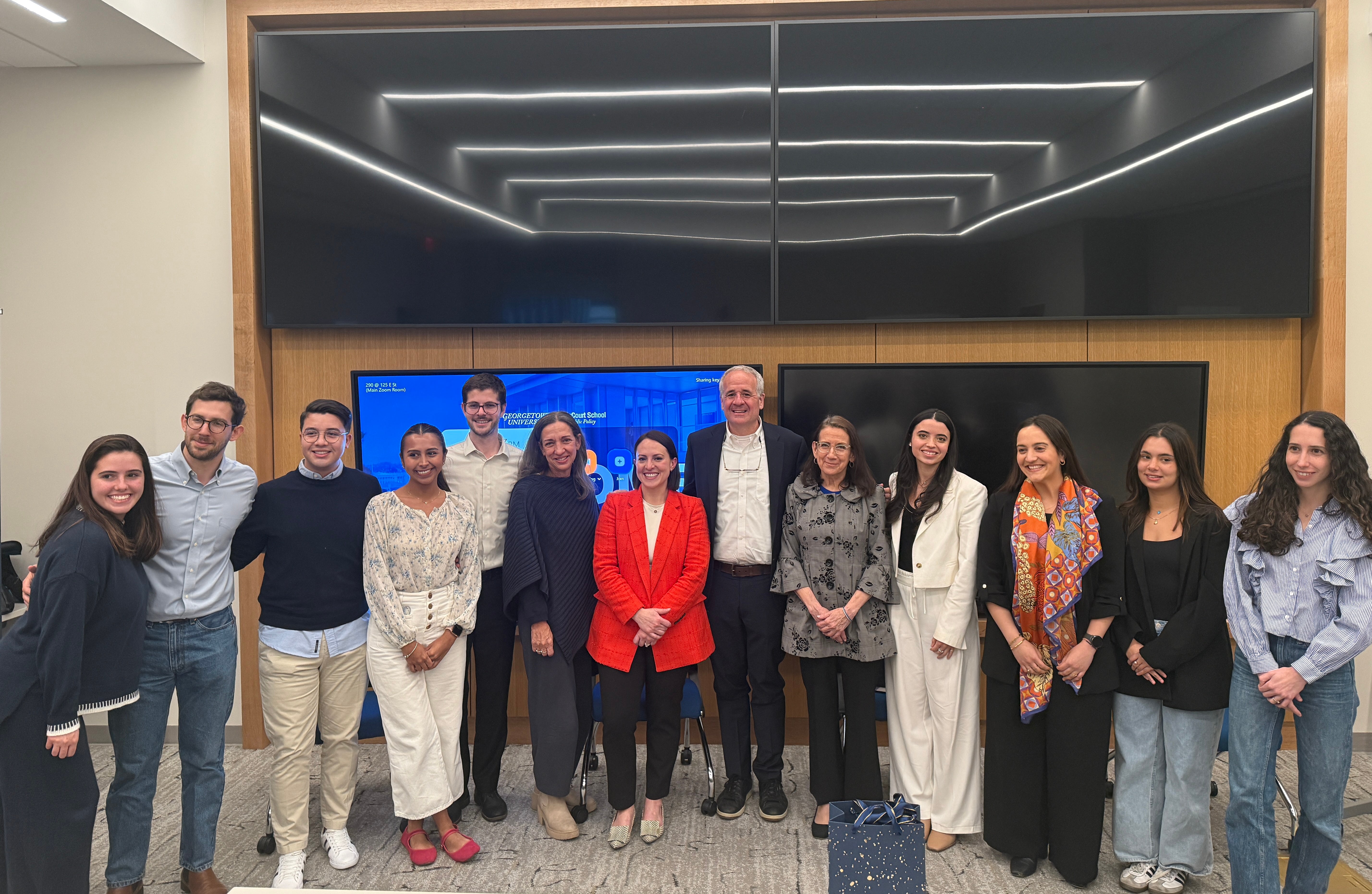 Dahdah posing for a photo at an event with students from the Latin America and the Caribbean Policy Association (LAPA) at Georgetown University