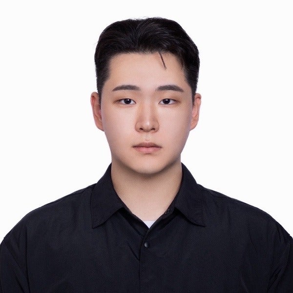 Jehan Im, short black hair, light skin tone, neutral expression, black collared shirt, white background