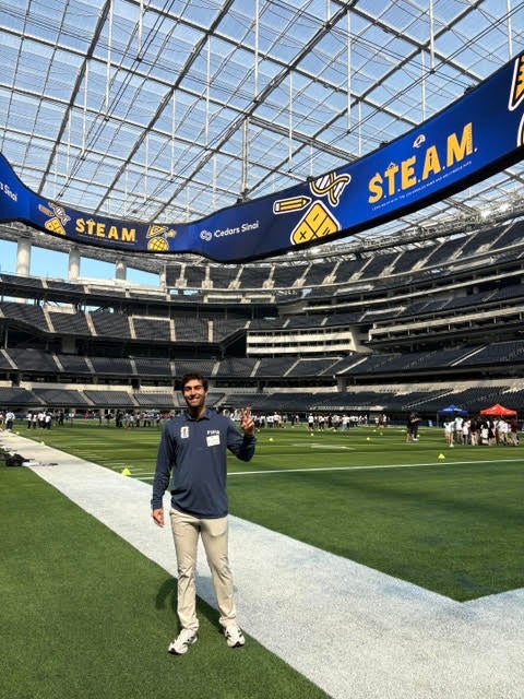 Sina Nemazi on field of World Cup stadium