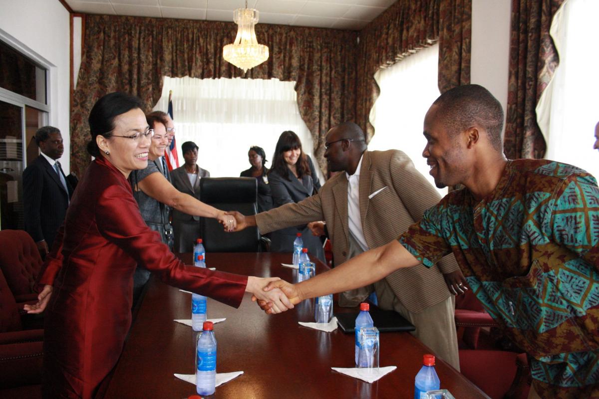 At work as Deputy Chief of Staff to President Sirleaf, Gyude Moore meets with World Bank Managing Director, Sri Mulyani Indrawati