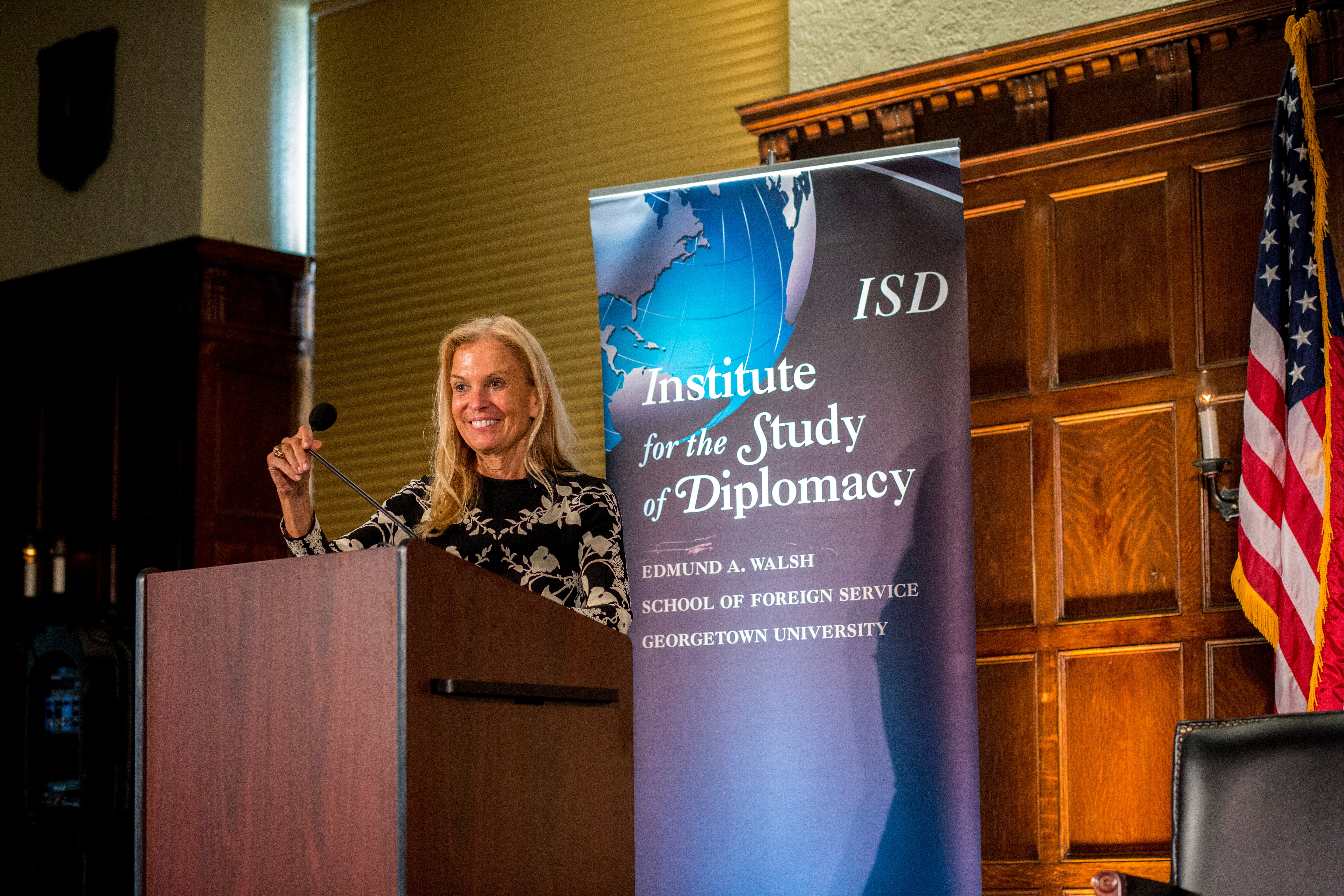 Ambassador Jane Hartley at podium